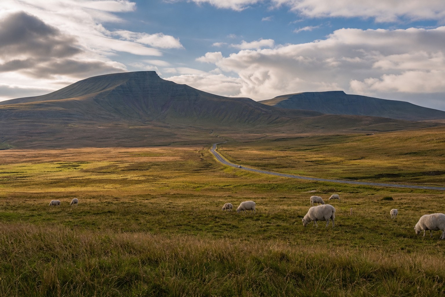 Pen y Fan in the Brecon Beacons with a road running through