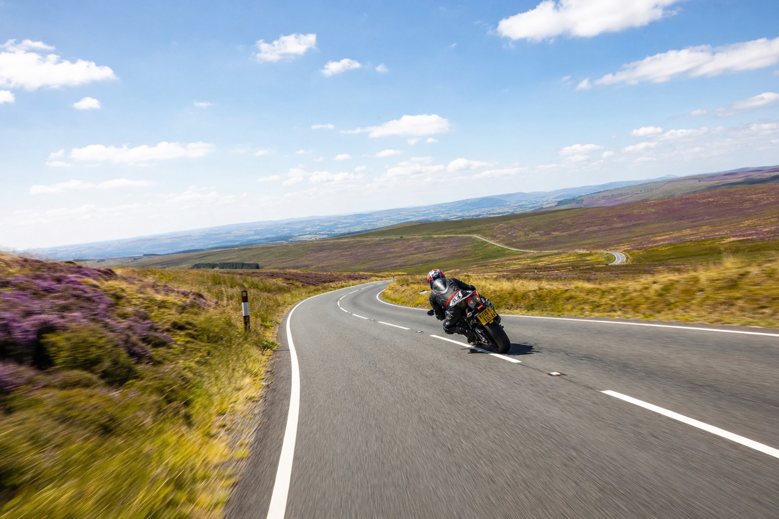 Fast open sweeping road across the Denbigh moors, the Evo Triangle