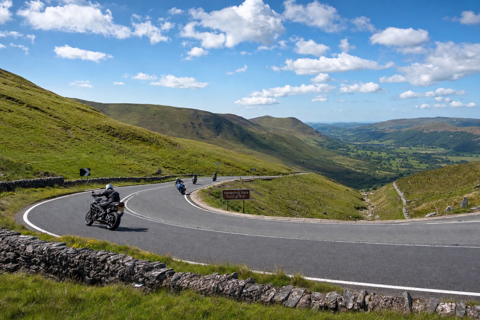 Motorcycles on the Horseshoe Pass bend near Llangollen